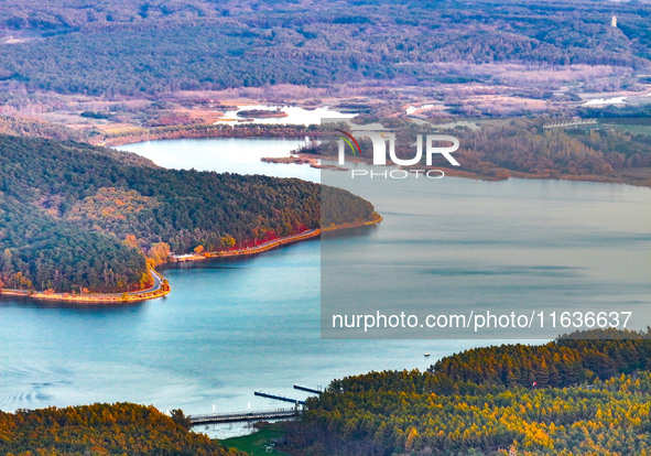 The scenery of Jingyuetan National Forest Park in Changchun, Jilin province, China, on October 4, 2024, is shown. 