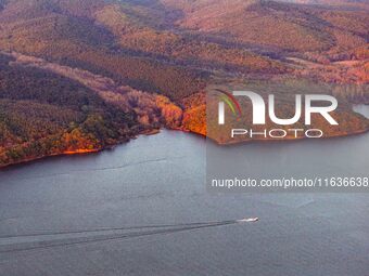 The scenery of Jingyuetan National Forest Park in Changchun, Jilin province, China, on October 4, 2024, is shown. (