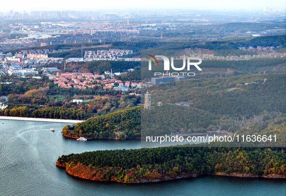 The scenery of Jingyuetan National Forest Park in Changchun, Jilin province, China, on October 4, 2024, is shown. 