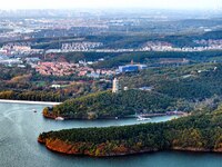 The scenery of Jingyuetan National Forest Park in Changchun, Jilin province, China, on October 4, 2024, is shown. (