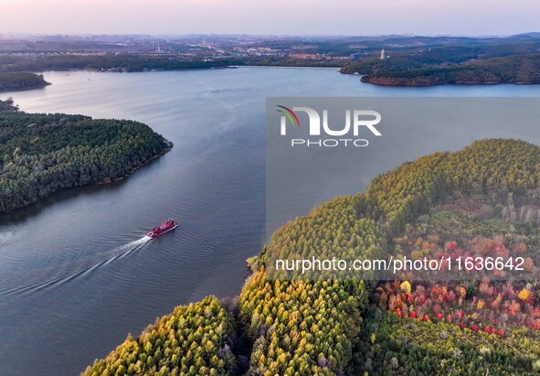 The scenery of Jingyuetan National Forest Park in Changchun, Jilin province, China, on October 4, 2024, is shown. 