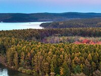 The scenery of Jingyuetan National Forest Park in Changchun, Jilin province, China, on October 4, 2024, is shown. (