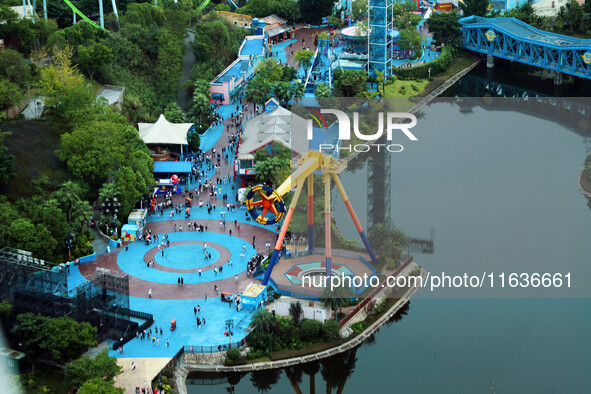 An aerial photo shows the Happy Valley scenic spot in Chongqing, China, on October 3, 2024. Chongqing Happy Valley opens on July 8, 2017, an...