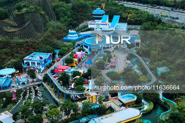 An aerial photo shows the Happy Valley scenic spot in Chongqing, China, on October 3, 2024. Chongqing Happy Valley opens on July 8, 2017, an...