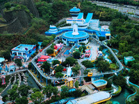 An aerial photo shows the Happy Valley scenic spot in Chongqing, China, on October 3, 2024. Chongqing Happy Valley opens on July 8, 2017, an...