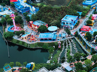 An aerial photo shows the Happy Valley scenic spot in Chongqing, China, on October 3, 2024. Chongqing Happy Valley opens on July 8, 2017, an...