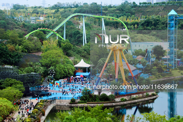 An aerial photo shows the Happy Valley scenic spot in Chongqing, China, on October 3, 2024. Chongqing Happy Valley opens on July 8, 2017, an...