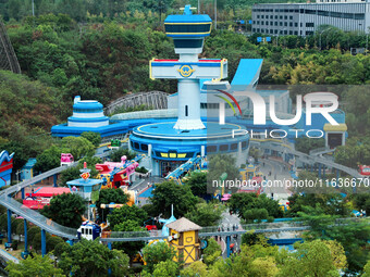 An aerial photo shows the Happy Valley scenic spot in Chongqing, China, on October 3, 2024. Chongqing Happy Valley opens on July 8, 2017, an...