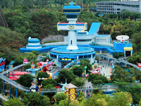 An aerial photo shows the Happy Valley scenic spot in Chongqing, China, on October 3, 2024. Chongqing Happy Valley opens on July 8, 2017, an...