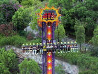 An aerial photo shows the Happy Valley scenic spot in Chongqing, China, on October 3, 2024. Chongqing Happy Valley opens on July 8, 2017, an...