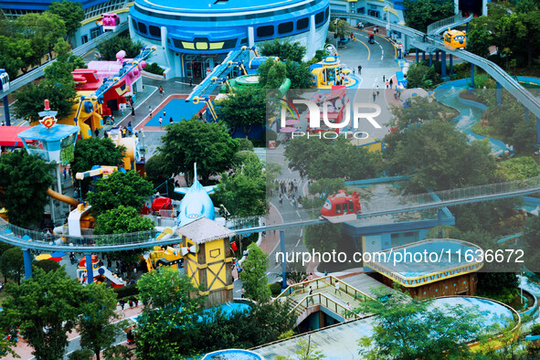 An aerial photo shows the Happy Valley scenic spot in Chongqing, China, on October 3, 2024. Chongqing Happy Valley opens on July 8, 2017, an...