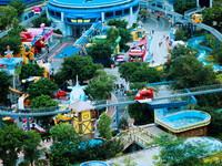 An aerial photo shows the Happy Valley scenic spot in Chongqing, China, on October 3, 2024. Chongqing Happy Valley opens on July 8, 2017, an...