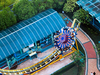 An aerial photo shows the Happy Valley scenic spot in Chongqing, China, on October 3, 2024. Chongqing Happy Valley opens on July 8, 2017, an...