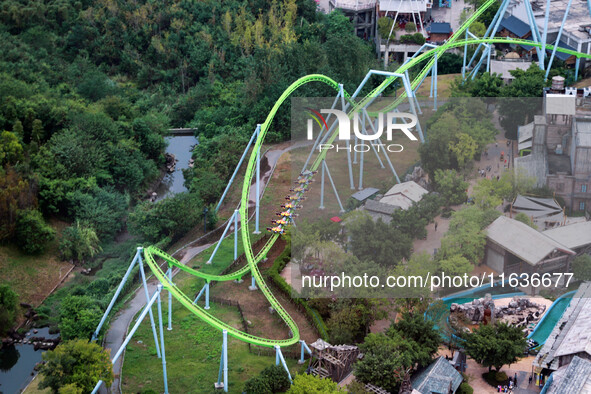 An aerial photo shows the Happy Valley scenic spot in Chongqing, China, on October 3, 2024. Chongqing Happy Valley opens on July 8, 2017, an...