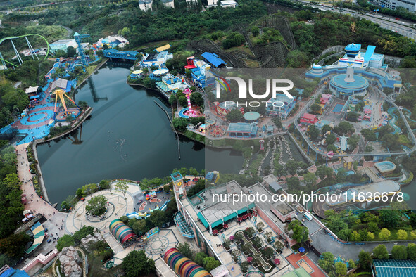 An aerial photo shows the Happy Valley scenic spot in Chongqing, China, on October 3, 2024. Chongqing Happy Valley opens on July 8, 2017, an...