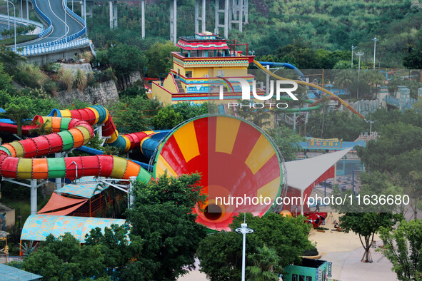 An aerial photo shows the Happy Valley scenic spot in Chongqing, China, on October 3, 2024. Chongqing Happy Valley opens on July 8, 2017, an...