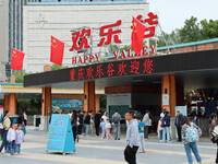 Tourists play at Happy Valley scenic spot in Chongqing, China, on October 4, 2024. Chongqing Happy Valley opens on July 8, 2017, and is the...