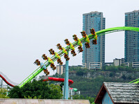 Tourists play at Happy Valley scenic spot in Chongqing, China, on October 4, 2024. Chongqing Happy Valley opens on July 8, 2017, and is the...