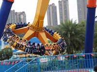 Tourists play at Happy Valley scenic spot in Chongqing, China, on October 4, 2024. Chongqing Happy Valley opens on July 8, 2017, and is the...