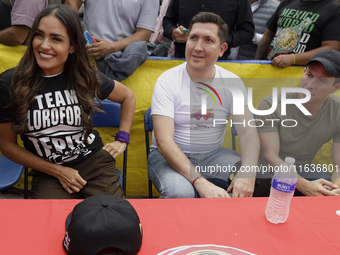 Alessandra Rojo de la Vega (left), mayor of Cuauhtemoc in Mexico City, accompanies the inhabitants of Tepito in Mexico City, Mexico, on Octo...