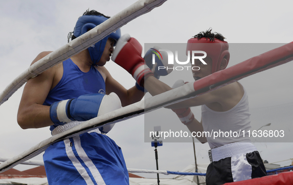 A boxing event takes place in Tepito, Mexico City, on October 4, 2024, where the inhabitants celebrate the Day of St. Francis of Assisi, who...