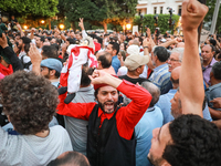 A demonstrator raises a puppet and shouts slogans against President Kais Saied during a demonstration organized by the Tunisian Network for...