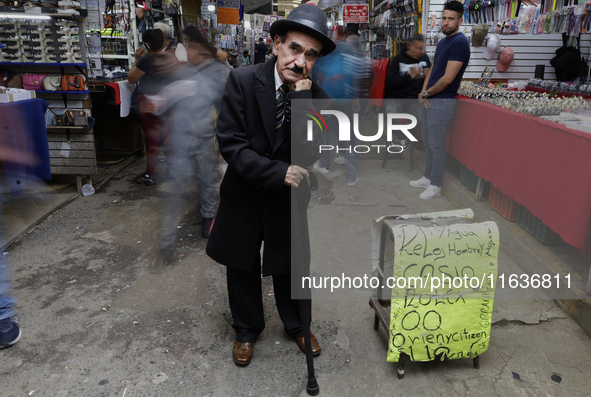 A Charles Chaplin impersonator performs in Tepito, Mexico City, on October 4, 2024, where the inhabitants celebrate the Day of St. Francis o...