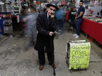 A Charles Chaplin impersonator performs in Tepito, Mexico City, on October 4, 2024, where the inhabitants celebrate the Day of St. Francis o...