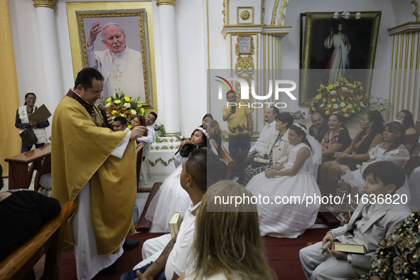 A view of a first communion in a church in Tepito, Mexico City, on October 4, 2024, where the inhabitants celebrate the Day of St. Francis o...