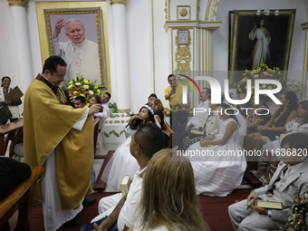 A view of a first communion in a church in Tepito, Mexico City, on October 4, 2024, where the inhabitants celebrate the Day of St. Francis o...