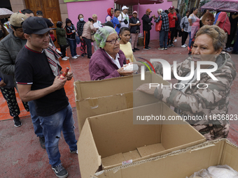 Inhabitants of Tepito live together in Mexico City, Mexico, on October 4, 2024, where they celebrate the Day of Saint Francis of Assisi, who...