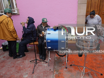 Inhabitants of Tepito live together in Mexico City, Mexico, on October 4, 2024, where they celebrate the Day of Saint Francis of Assisi, who...