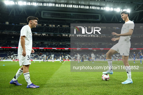 (L) David Jimenez right-back of Real Madrid and Spain and (R) Jacobo Ramon centre-back of Real Madrid and Spain during the warm-up before th...