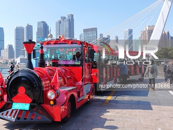 Tourists visit the International Sailing Center in Qingdao, China, on October 3, 2024. (