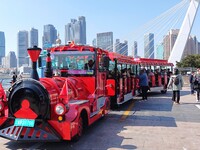 Tourists visit the International Sailing Center in Qingdao, China, on October 3, 2024. (