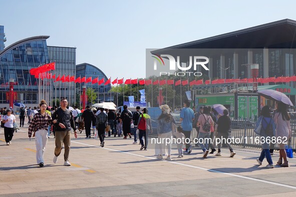 Tourists visit the International Sailing Center in Qingdao, China, on October 3, 2024. 