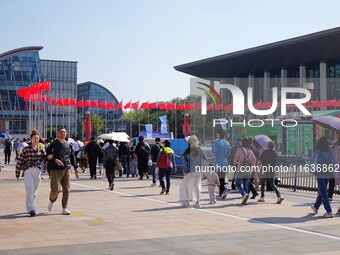 Tourists visit the International Sailing Center in Qingdao, China, on October 3, 2024. (