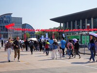 Tourists visit the International Sailing Center in Qingdao, China, on October 3, 2024. (