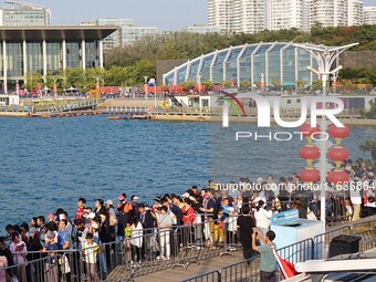 Tourists visit the International Sailing Center in Qingdao, China, on October 3, 2024. (