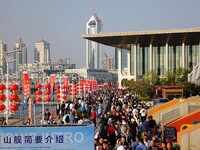 Tourists visit the International Sailing Center in Qingdao, China, on October 3, 2024. (