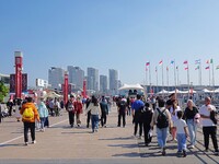 Tourists visit the International Sailing Center in Qingdao, China, on October 3, 2024. (