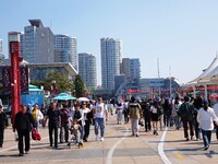 Tourists visit the International Sailing Center in Qingdao, China, on October 3, 2024. (