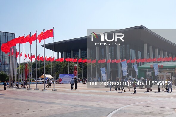 Tourists visit the International Sailing Center in Qingdao, China, on October 3, 2024. 