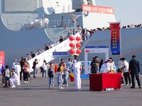 Tourists visit the International Sailing Center in Qingdao, China, on October 3, 2024. (