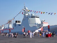 Tourists visit the International Sailing Center in Qingdao, China, on October 3, 2024. (