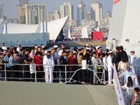 Tourists visit the International Sailing Center in Qingdao, China, on October 3, 2024. (