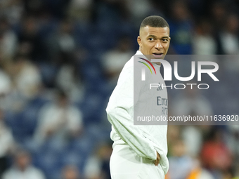 Kylian Mbappe centre-forward of Real Madrid and France during the warm-up before the La Liga match between Real Madrid CF and Deportivo Alav...