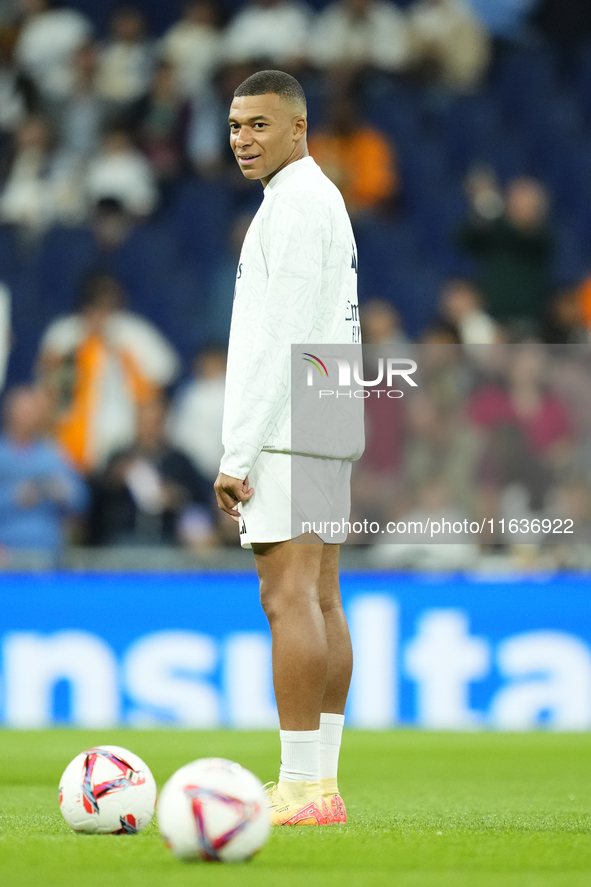 Kylian Mbappe centre-forward of Real Madrid and France during the warm-up before the La Liga match between Real Madrid CF and Deportivo Alav...