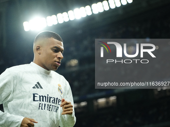 Kylian Mbappe centre-forward of Real Madrid and France during the warm-up before the La Liga match between Real Madrid CF and Deportivo Alav...