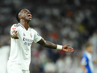 Vinicius Junior left winger of Real Madrid and Brazil reacts during the La Liga match between Real Madrid CF and Deportivo Alavés at Estadio...